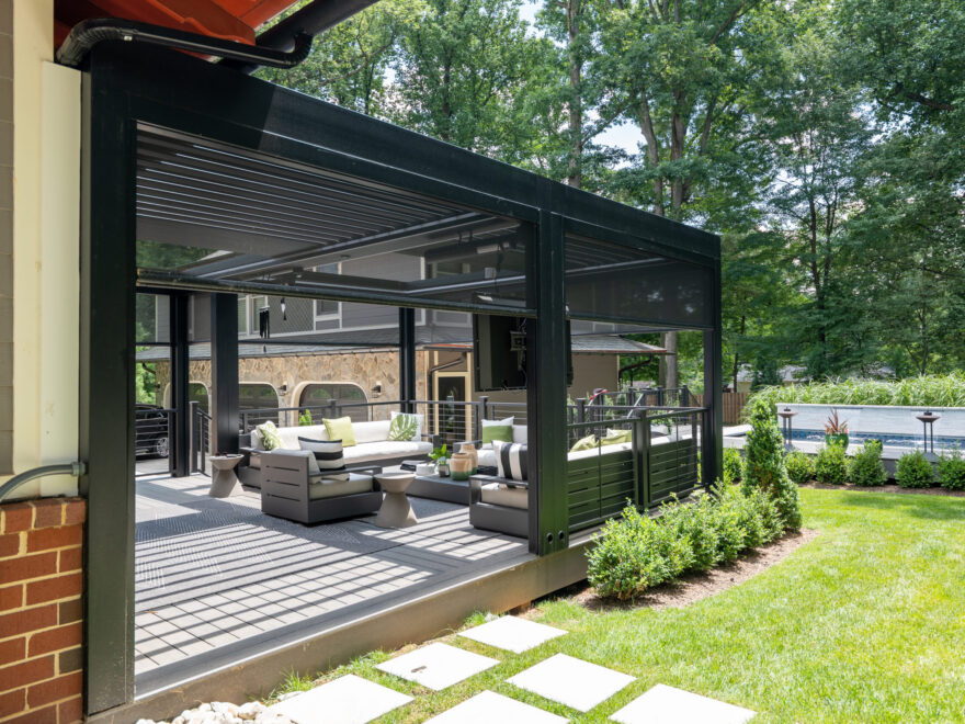 Screened-in porch addition connected to the back of a home