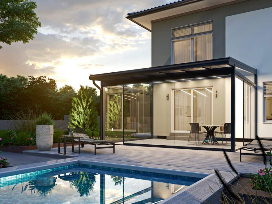 Modern sunroom with large windows, wood accents, and comfortable contemporary furniture