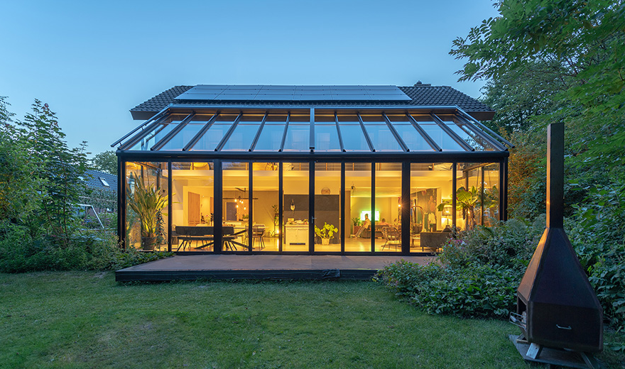 Sunroom in Arlington VA featuring large windows and a bright, comfortable seating area