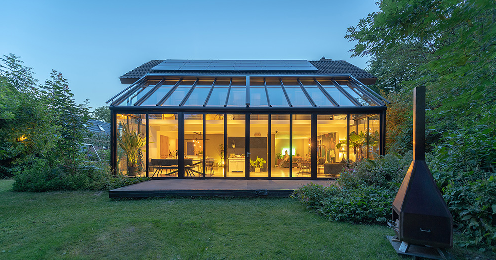 Sunroom in Arlington VA featuring large windows and a bright, comfortable seating area