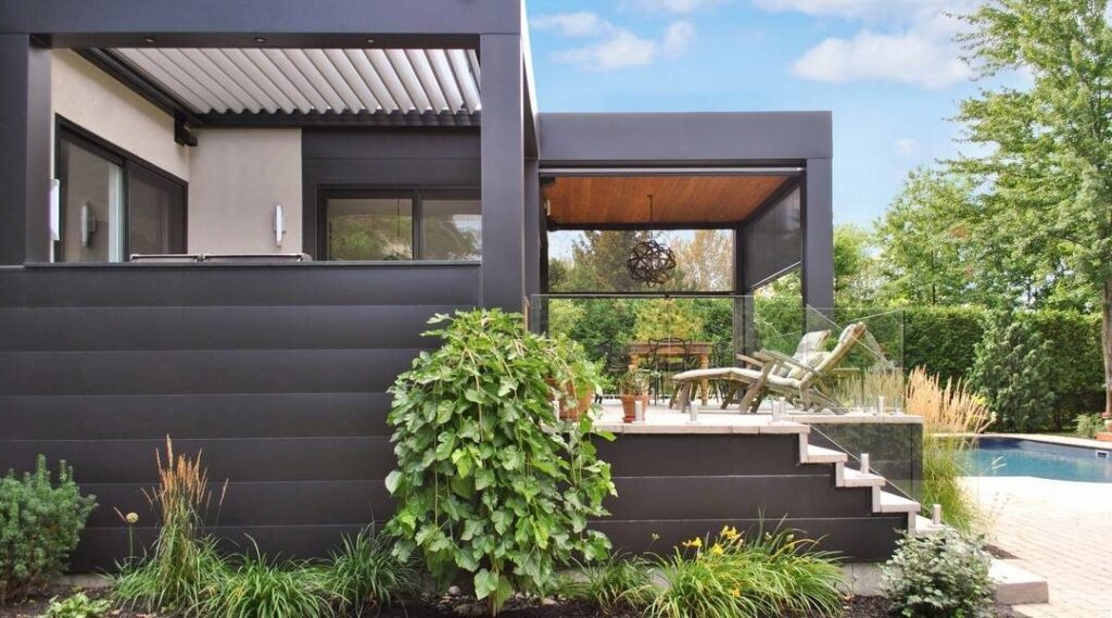 Spacious screened porch overlooking a green backyard